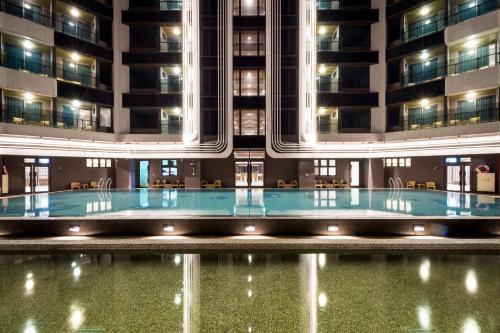 Bazén v ubytování Cuncyue Hot Spring Resort nebo v jeho okolí