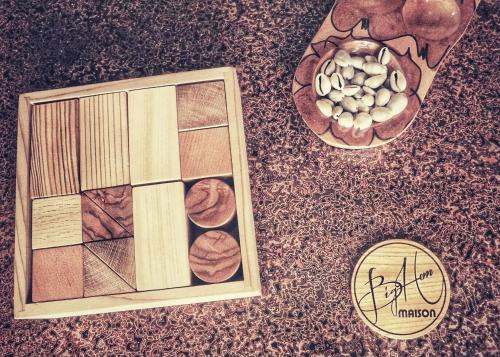 a picture of a box of nuts and a bowl of fruit at Bighem Maison in Izumi-Sano