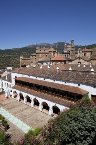 a white building with a bunch of buildings at Parador de Guadalupe in Guadalupe