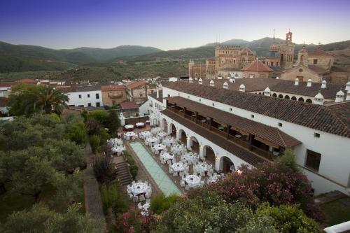 an aerial view of a building with tables and chairs at Parador de Guadalupe in Guadalupe