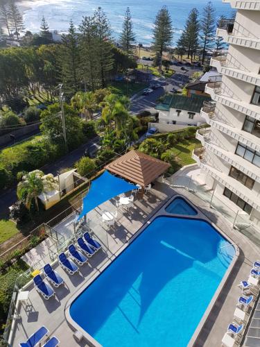 an overhead view of the pool at the resort at Gemini Court Holiday Apartments in Gold Coast