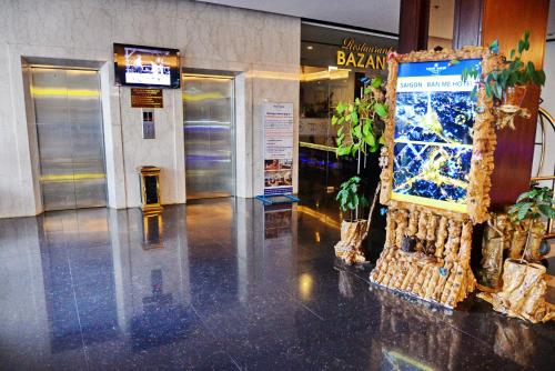 a lobby of a building with a sign in front of it at Sai Gon Ban Me Hotel in Buon Ma Thuot