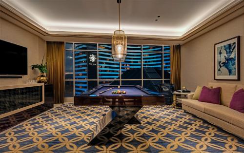 a living room with a pool table in it at The Darling at The Star Gold Coast in Gold Coast
