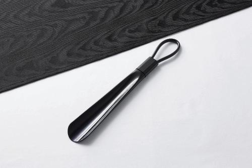 a black plastic spatula sitting on top of a table at APA Hotel Sagaeki Minamiguchi in Saga