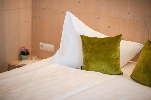 Postel nebo postele na pokoji v ubytování Hotel Pustertalerhof