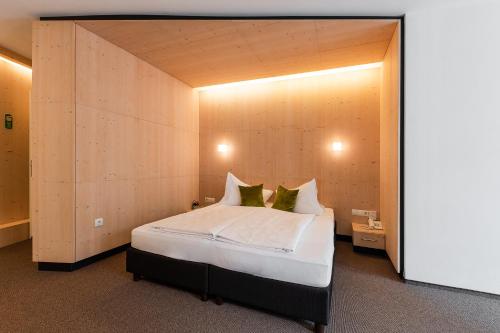 Postel nebo postele na pokoji v ubytování Hotel Pustertalerhof