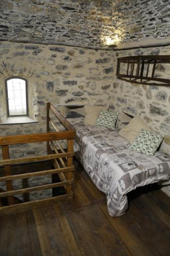 Ένα ή περισσότερα κρεβάτια σε δωμάτιο στο Casa Francesca Torre Saracena