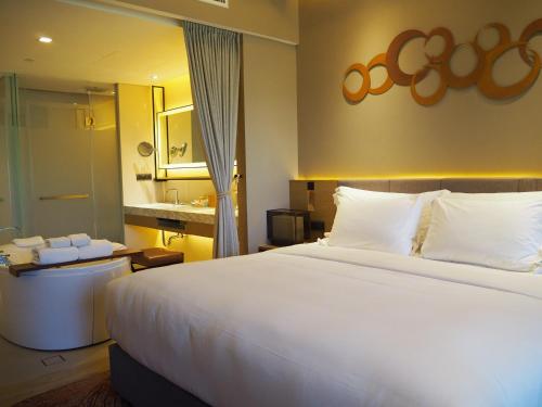 Ein Bett oder Betten in einem Zimmer der Unterkunft dusitD2 Khao Yai