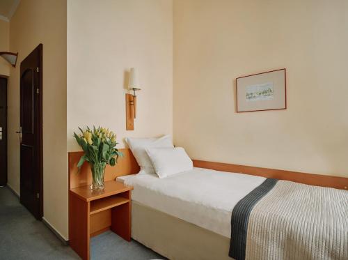 Katil atau katil-katil dalam bilik di Hotel Zamojski