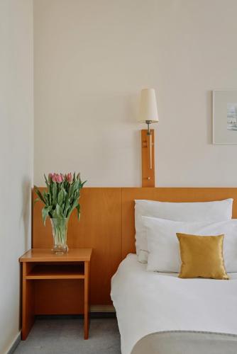 Katil atau katil-katil dalam bilik di Hotel Zamojski