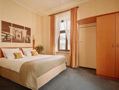 Katil atau katil-katil dalam bilik di Hotel Zamojski