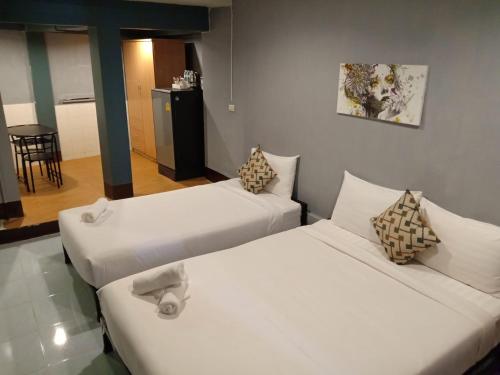 Cama o camas de una habitación en M Place