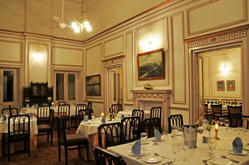 A restaurant or other place to eat at Palace Hotel - Bikaner House