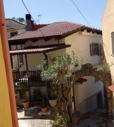an outside view of a house with a building at Borgo Medievale Squillace in Squillace