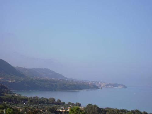 a view of a lake with mountains in the background at Borgo Medievale Squillace in Squillace