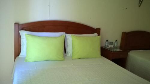 Postel nebo postele na pokoji v ubytování Residencial Idalio