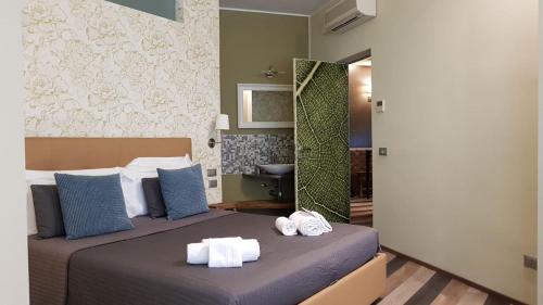 Posteľ alebo postele v izbe v ubytovaní Serendipity Rooms