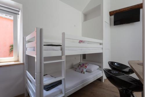 Ένα ή περισσότερα κρεβάτια σε δωμάτιο στο Guest House Blue