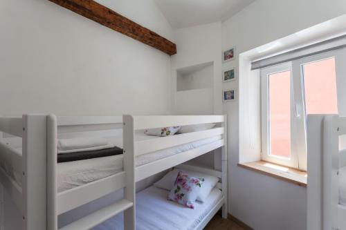 Ένα ή περισσότερα κρεβάτια σε δωμάτιο στο Guest House Blue