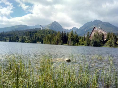a view of a lake with mountains in the background at Apartment Eric 9D High Tatras in Vysoké Tatry