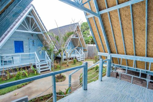 a view from the balcony of a house at D'Yuki Huts Lembongan in Nusa Lembongan