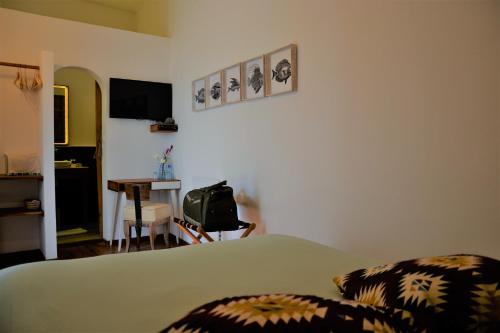 Una cama o camas en una habitación de Dar Korsan