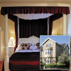 a bedroom with a canopy bed and a picture of a house at The Bath House Boutique B&B - IN-ROOM Breakfast - FREE parking in Bath