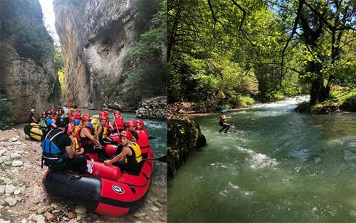 a group of people on a raft in a river at Hotel Assisivm Antica Dimora AD in Assisi