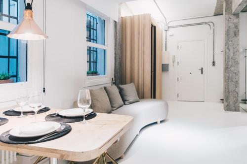 Ένα ή περισσότερα κρεβάτια σε δωμάτιο στο Kaia Apartment by People Rentals