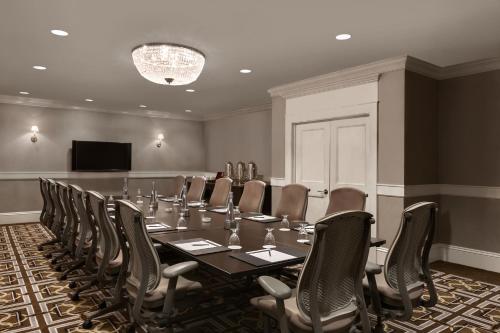 a conference room with a long table and chairs at Fairmont Copley Plaza in Boston