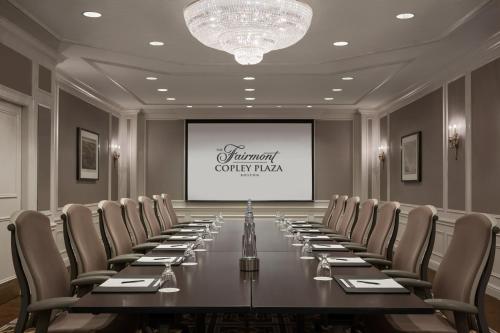 a conference room with a long table and chairs at Fairmont Copley Plaza in Boston