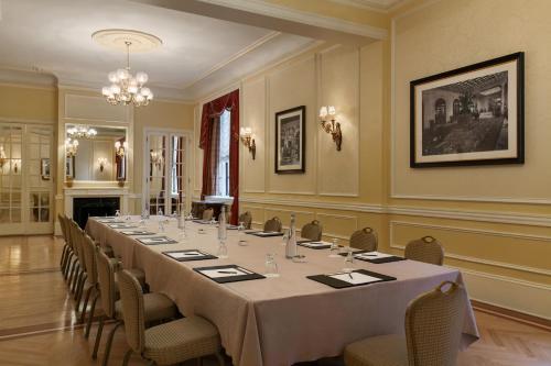 a large conference room with a long table and chairs at Fairmont Copley Plaza in Boston