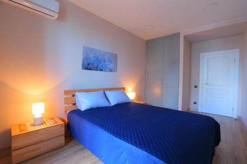 Ένα ή περισσότερα κρεβάτια σε δωμάτιο στο Stylish 2-rooms apartment
