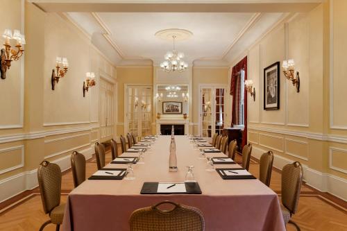 a conference room with a long table and chairs at Fairmont Copley Plaza in Boston
