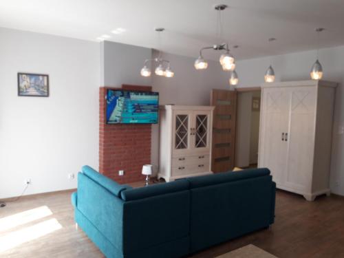 Televisyen dan/atau pusat hiburan di Apartament Centrum