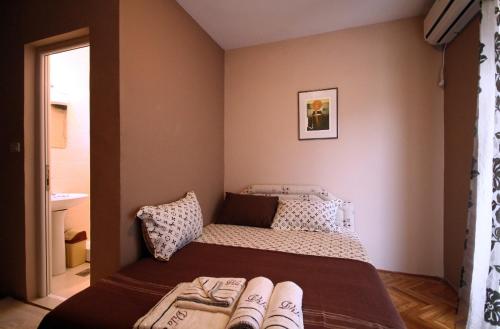 Katil atau katil-katil dalam bilik di Apartments Vila Galileo