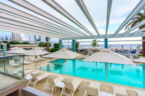 A view of the pool at Elinotel Sermilia Resort or nearby