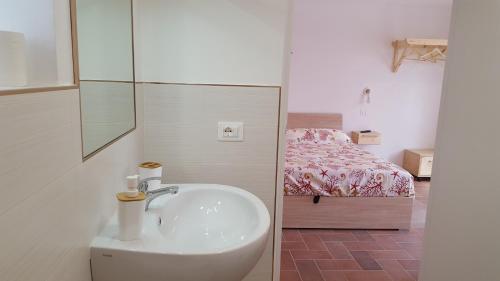 Katil atau katil-katil dalam bilik di Agriturismo Cupido