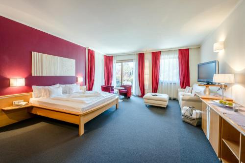 Ένα ή περισσότερα κρεβάτια σε δωμάτιο στο Hotel Ansitz Plantiz