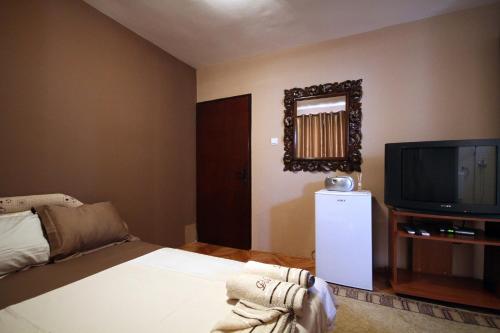 Televisyen dan/atau pusat hiburan di Apartments Vila Galileo