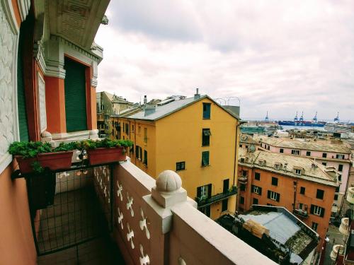 a view of a city from a balcony at Hotel Vittoria in Genova
