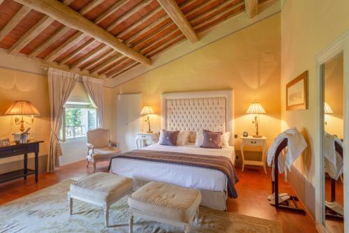เตียงในห้องที่ Villa Pitti Amerighi - Residenza d'Epoca
