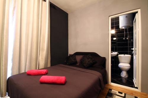 Katil atau katil-katil dalam bilik di Apartments Vila Galileo