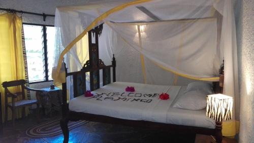 Postel nebo postele na pokoji v ubytování Flamingo Villas Resort