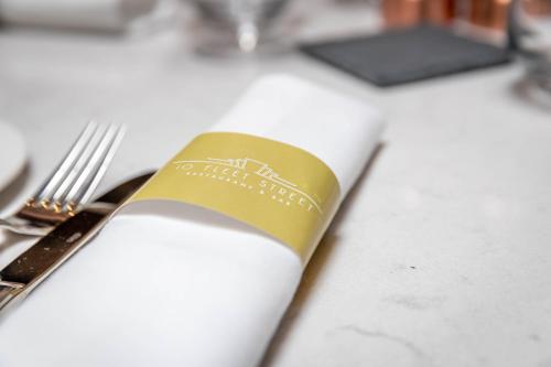 a table with a silver fork and a napkin at The Morgan Hotel in Dublin