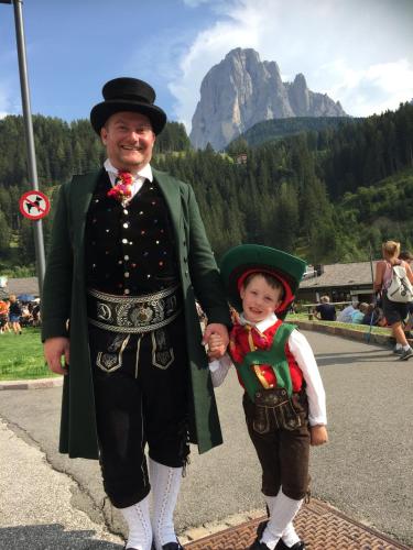 a man and a child dressed up in costumes at Garni Franca b&b in Selva di Val Gardena