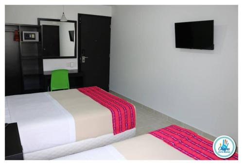 Hotel Parque Marimbaにあるベッド