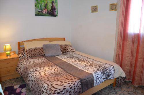 Giường trong phòng chung tại Casa Elena Gersi