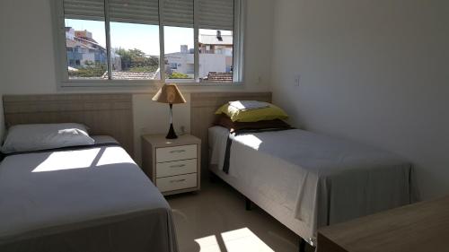 Katil atau katil-katil dalam bilik di Apartamento Duplex