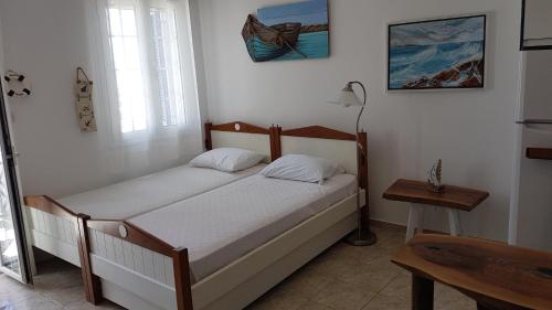 A bed or beds in a room at Nesaea Studio
